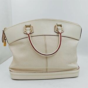 Authentic Louis Vuitton Suhali goatskin leather lock it bag with lock and key